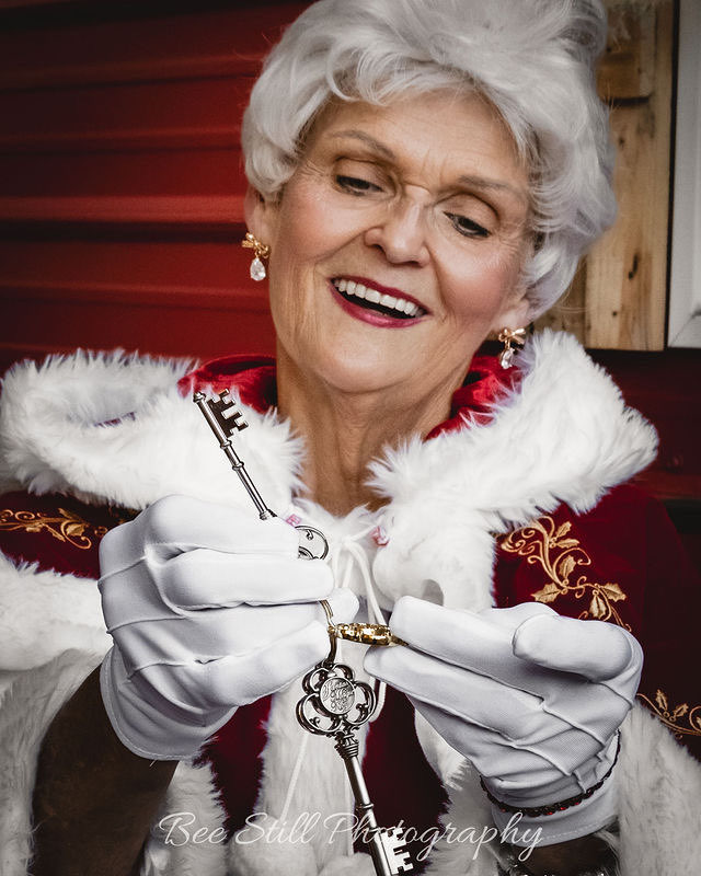 Mrs. Claus holding the keys to the North Pole